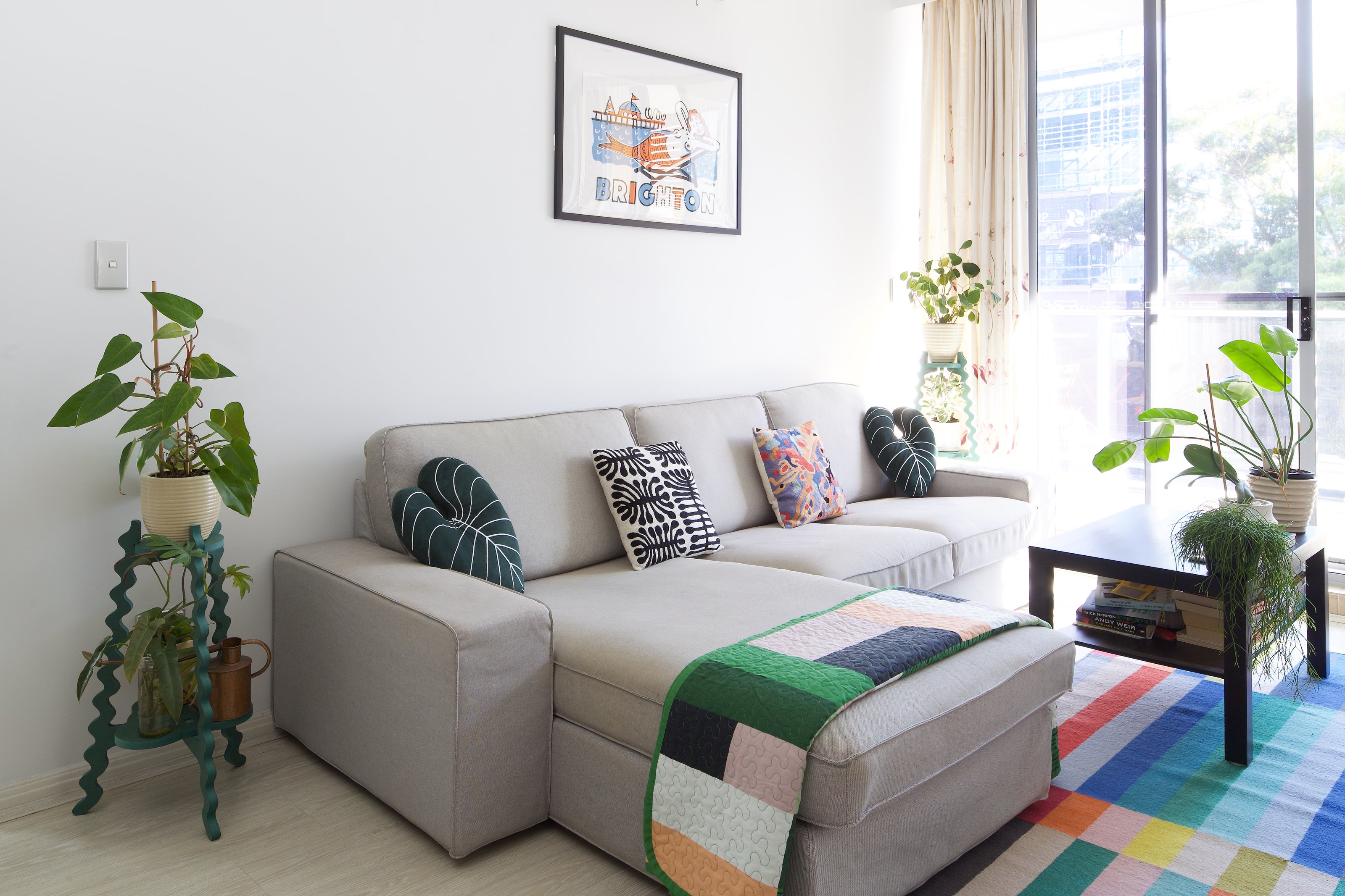 Xigglie Sage Two-Up Plant Stand.  Australian designed and made in green moisture resistant MDF. Supporting indoor plants in modern living room.