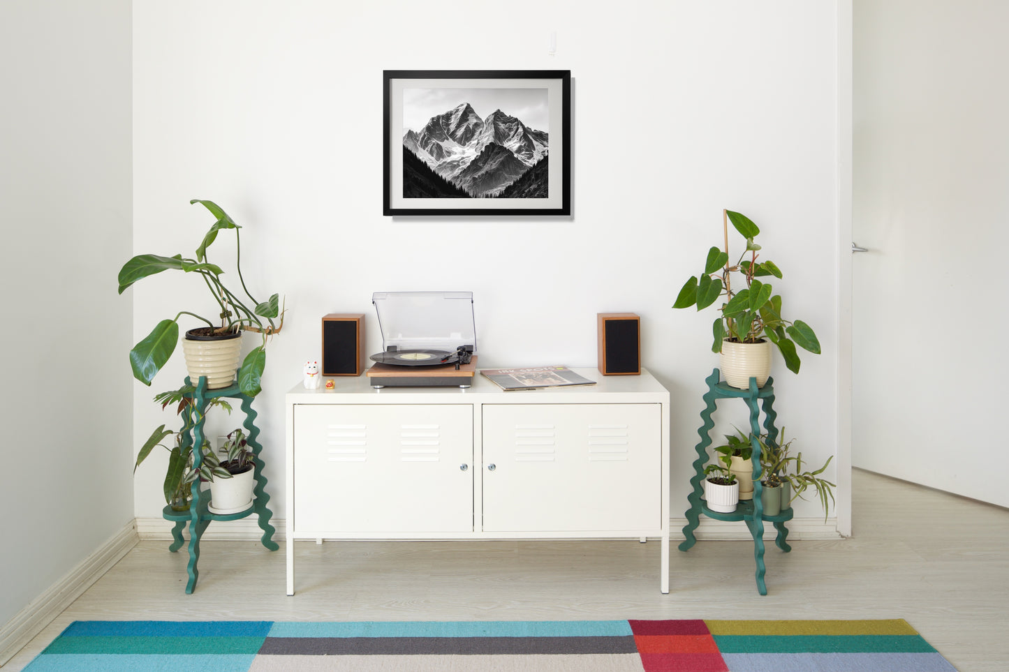 Two Xigglie Sage Two-Up Plant Stands.  Australian designed and made in green moisture resistant MDF. Supporting plants in modern living room.