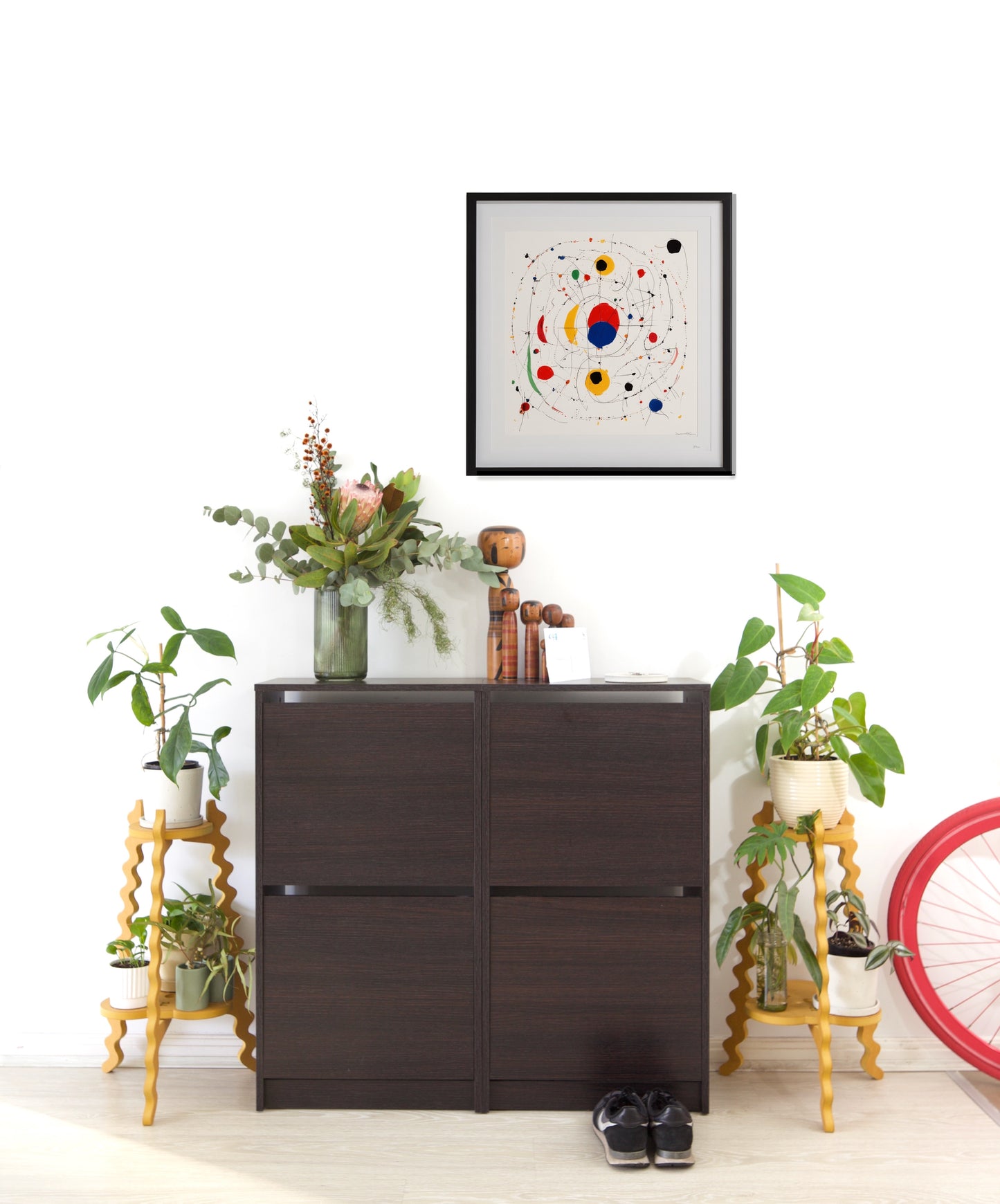 Two Xigglie Saffron Two-Up Plant Stands.  Australian designed and made in yellow moisture resistant MDF. Supporting indoor plants in modern entrance hall.