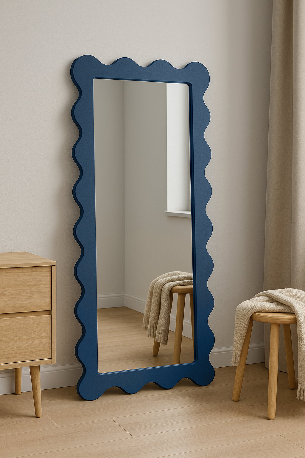 Floor mirror with blue Xigglie frame in a modern bedroom.