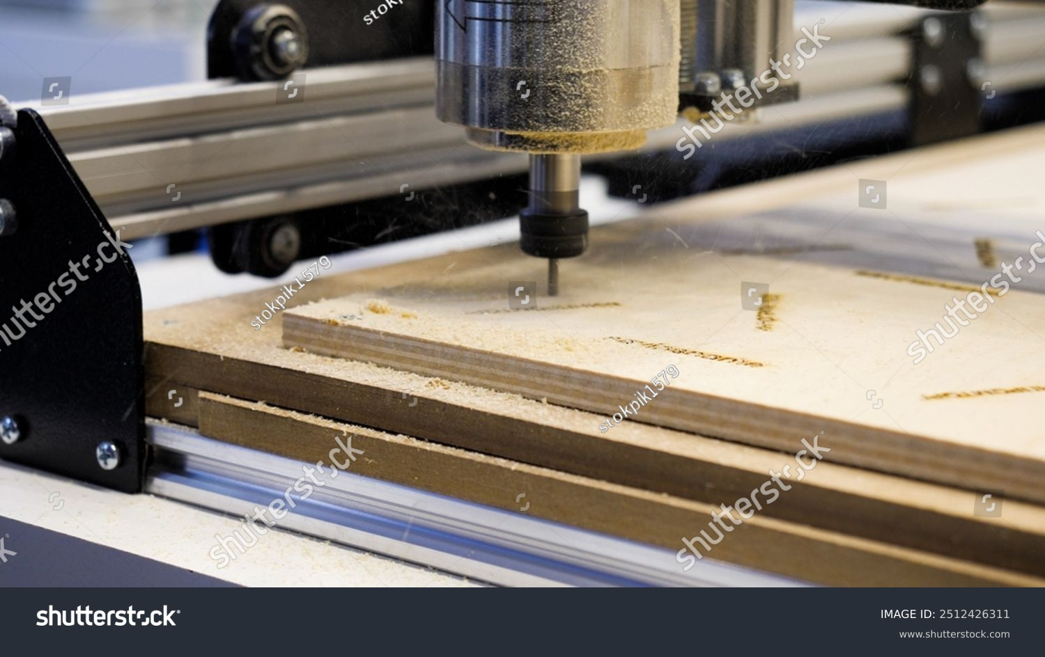 Close up view of CNC cutting machine router head at work